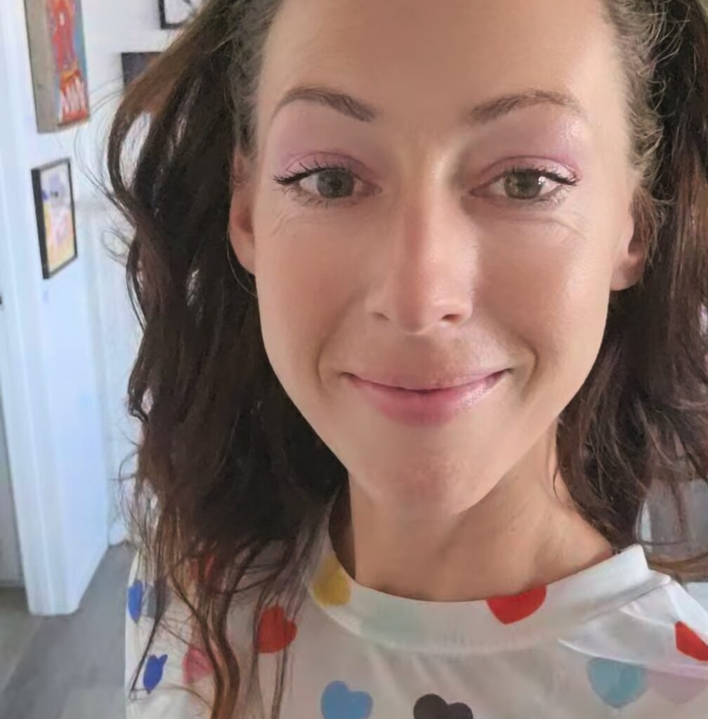 Portrait of Erica Franz, WordPress and Shopify Developer.